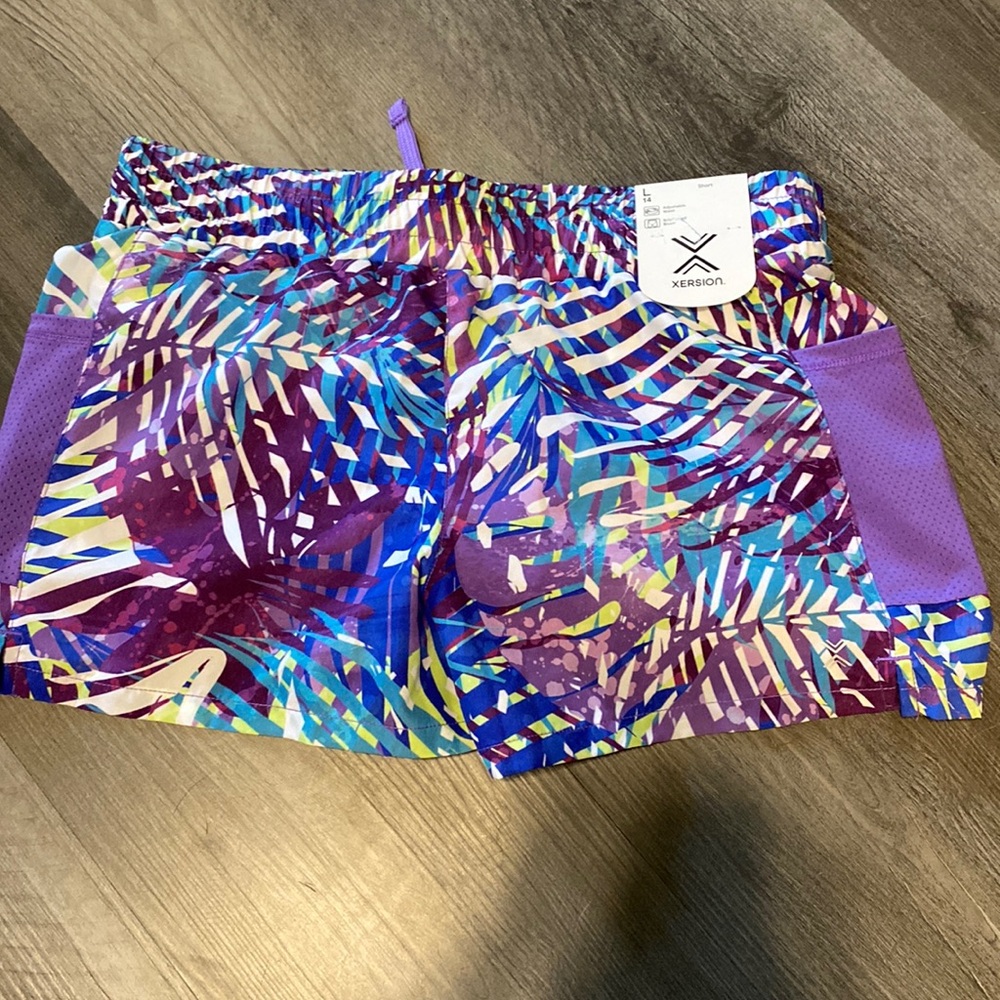 Girls Xerison shorts new with tags. Multicolored shorts.